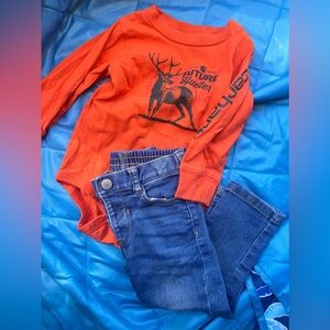 Carhartt shirt and a pair of jeans outfit